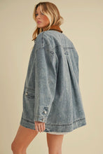 Load image into Gallery viewer, Woman wearing a denim jacket on a beige background