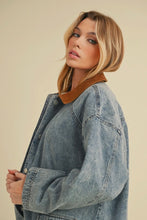 Load image into Gallery viewer, Woman wearing a denim jacket with a brown collar against a beige background