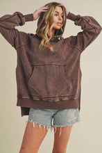 Load image into Gallery viewer, Person wearing a brown hoodie and denim shorts on a beige background