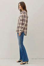 Load image into Gallery viewer, Woman wearing a plaid shirt and blue jeans on a plain background