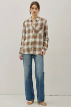 Load image into Gallery viewer, Person wearing a plaid shirt and jeans on a plain background