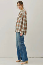 Load image into Gallery viewer, Person wearing a plaid shirt and jeans on a plain background