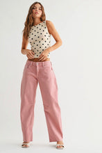 Load image into Gallery viewer, Woman wearing a polka dot top and pink pants on a white background