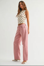 Load image into Gallery viewer, Woman wearing a polka dot top and pink pants on a white background