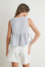 Load image into Gallery viewer, Woman wearing a sleeveless checkered top and white shorts on a plain background