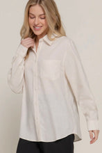 Load image into Gallery viewer, Woman wearing a light beige button-up shirt against a plain background