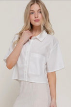 Load image into Gallery viewer, Woman wearing a white short-sleeve shirt against a plain background