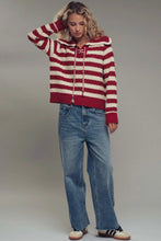 Load image into Gallery viewer, Person wearing a red and white striped sweater and blue jeans against a plain background