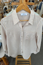 Load image into Gallery viewer, Striped shirt on a hanger with a blurred store background