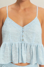 Load image into Gallery viewer, Light blue sleeveless top with button details on a neutral background