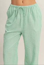 Load image into Gallery viewer, Green striped pants on a plain background