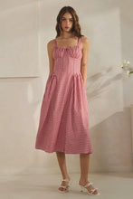 Load image into Gallery viewer, Woman wearing a red and white checkered dress against a neutral background