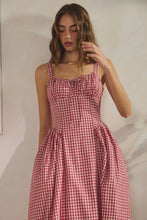 Load image into Gallery viewer, Woman wearing a red and white checkered dress against a plain background