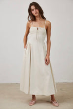 Load image into Gallery viewer, Woman wearing a white dress against a plain background