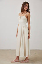 Load image into Gallery viewer, Woman wearing a white dress against a plain background