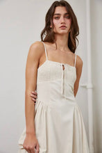 Load image into Gallery viewer, Woman wearing a white dress against a plain background