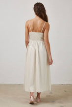 Load image into Gallery viewer, Woman wearing a white dress with thin straps against a plain background