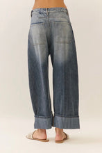 Load image into Gallery viewer, Blue jeans with a ribbed bottom hem on a plain background