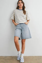 Load image into Gallery viewer, Woman wearing a striped shirt and denim shorts against a plain background