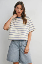 Load image into Gallery viewer, Woman wearing a striped shirt and denim shorts on a plain background