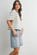 Load image into Gallery viewer, Woman wearing a striped shirt and denim shorts on a plain background