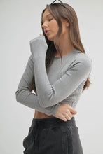 Load image into Gallery viewer, Woman wearing a gray long-sleeve top and black pants on a white background