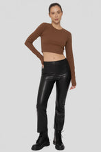 Load image into Gallery viewer, Woman wearing a brown long-sleeve top and black leather pants on a white background