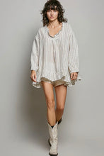 Load image into Gallery viewer, Woman wearing a striped dress and cowboy boots on a plain background