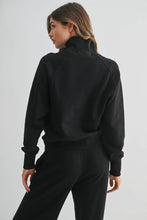 Load image into Gallery viewer, Person wearing a black outfit on a plain background