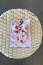 Load image into Gallery viewer, Gift box with strawberry pattern on a woven mat