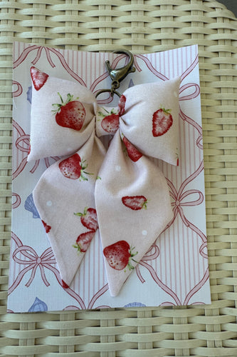 Fabric with strawberry pattern on a woven surface
