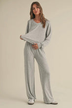 Load image into Gallery viewer, Woman wearing a gray loungewear set on a beige background
