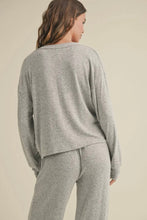 Load image into Gallery viewer, Woman wearing a gray lounge set on a beige background