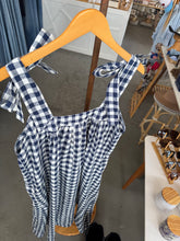 Load image into Gallery viewer, Blue and white checkered dress on a yellow hanger with a blurred indoor background