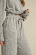 Load image into Gallery viewer, Person wearing a gray outfit with a matching headscarf on a beige background