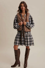 Load image into Gallery viewer, Woman wearing a plaid outfit with a vest and skirt, standing against a plain background