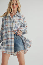 Load image into Gallery viewer, Woman wearing a plaid shirt and denim shorts on a plain background