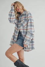 Load image into Gallery viewer, Woman wearing a plaid shirt and denim skirt on a plain background