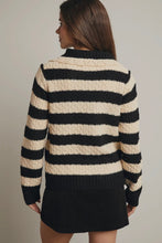 Load image into Gallery viewer, Person wearing a black and white striped sweater with a plain background