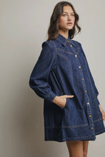 Load image into Gallery viewer, Woman wearing a blue denim dress against a plain background