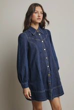Load image into Gallery viewer, Woman wearing a blue denim dress against a plain background