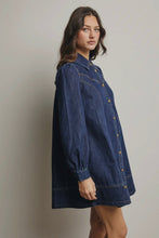 Load image into Gallery viewer, Woman wearing a blue denim dress against a plain background
