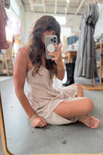 Load image into Gallery viewer, Woman taking a mirror selfie wearing a beige dress in a store.