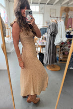 Load image into Gallery viewer, Woman wearing a gold dress in a clothing store