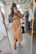 Load image into Gallery viewer, Woman taking a mirror selfie wearing a gold dress in a clothing store.