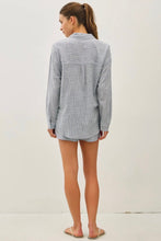 Load image into Gallery viewer, Woman wearing a gray checkered shirt and shorts on a white background