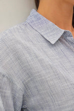 Load image into Gallery viewer, Close-up of a person wearing a striped shirt with a neutral background
