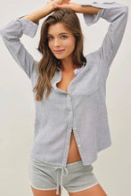 Load image into Gallery viewer, Woman wearing a striped shirt and shorts on a plain background