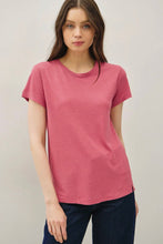 Load image into Gallery viewer, Woman wearing a pink t-shirt against a plain background
