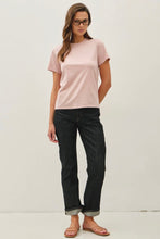 Load image into Gallery viewer, Woman wearing a pink t-shirt and black jeans on a white background